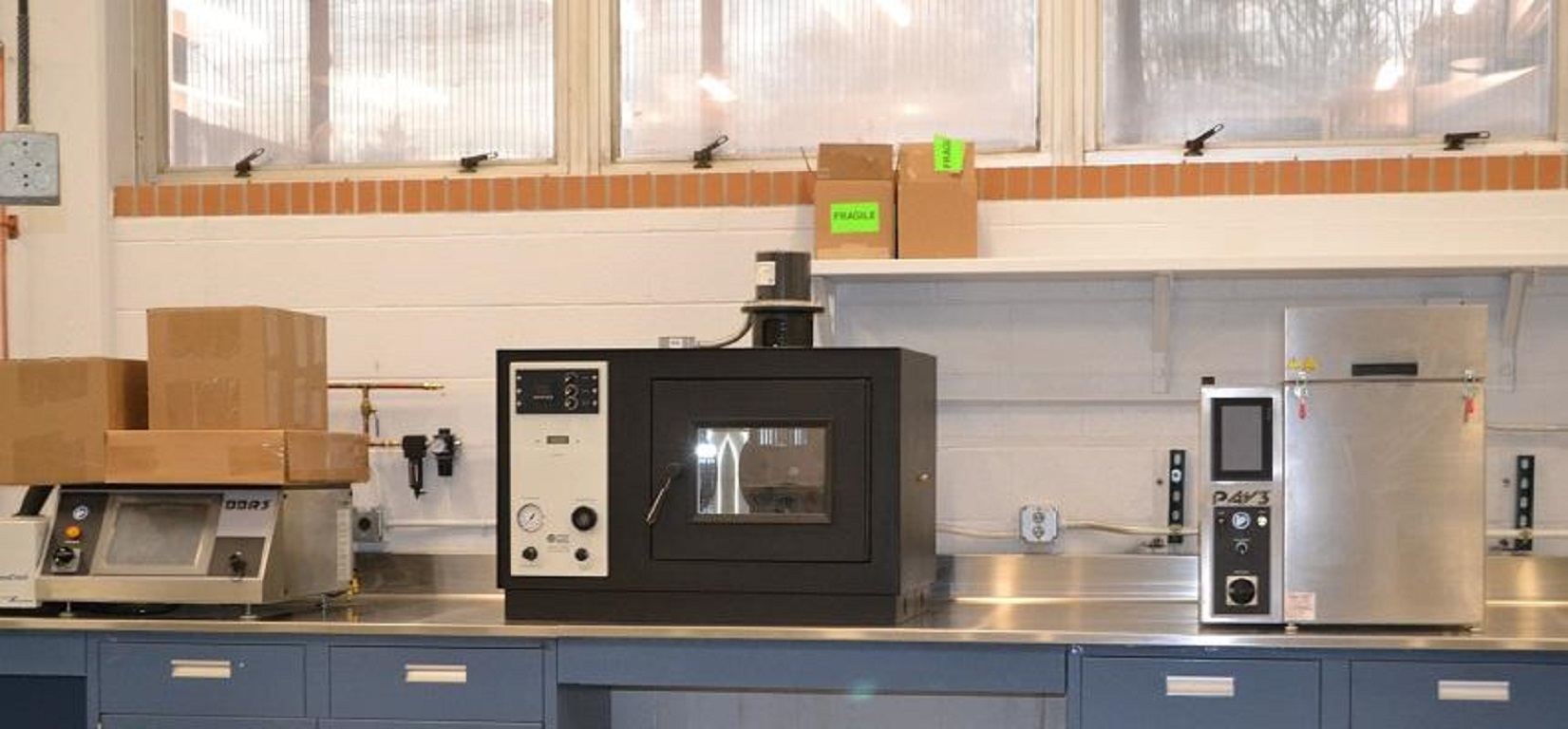 three different machines in the lab