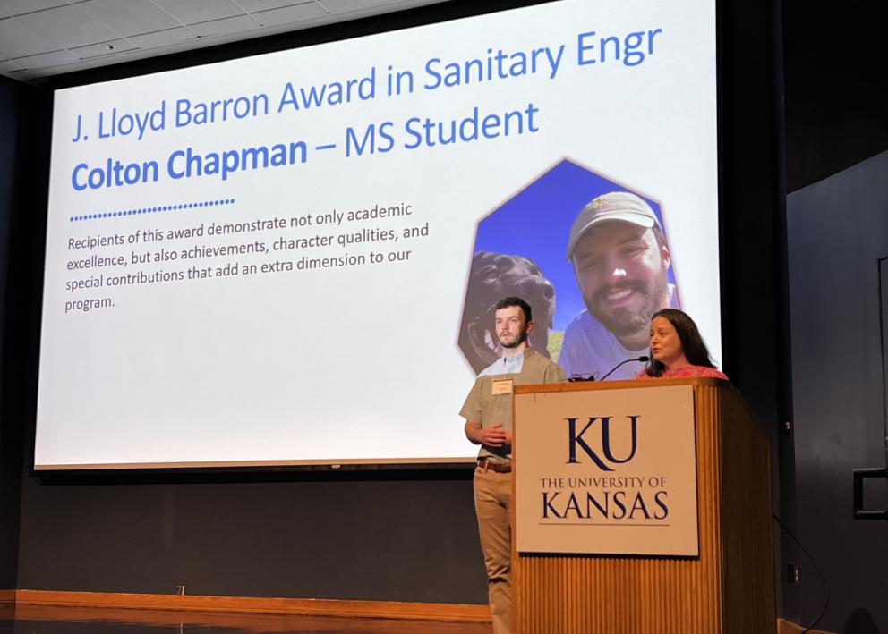 Colton Chapman receiving J. Lloyd Barron Award